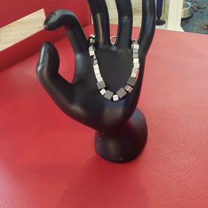 Silver tone and hematite bracelet